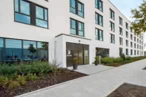 Отель Super 8 by Wyndham Munich City North  Мюнхен